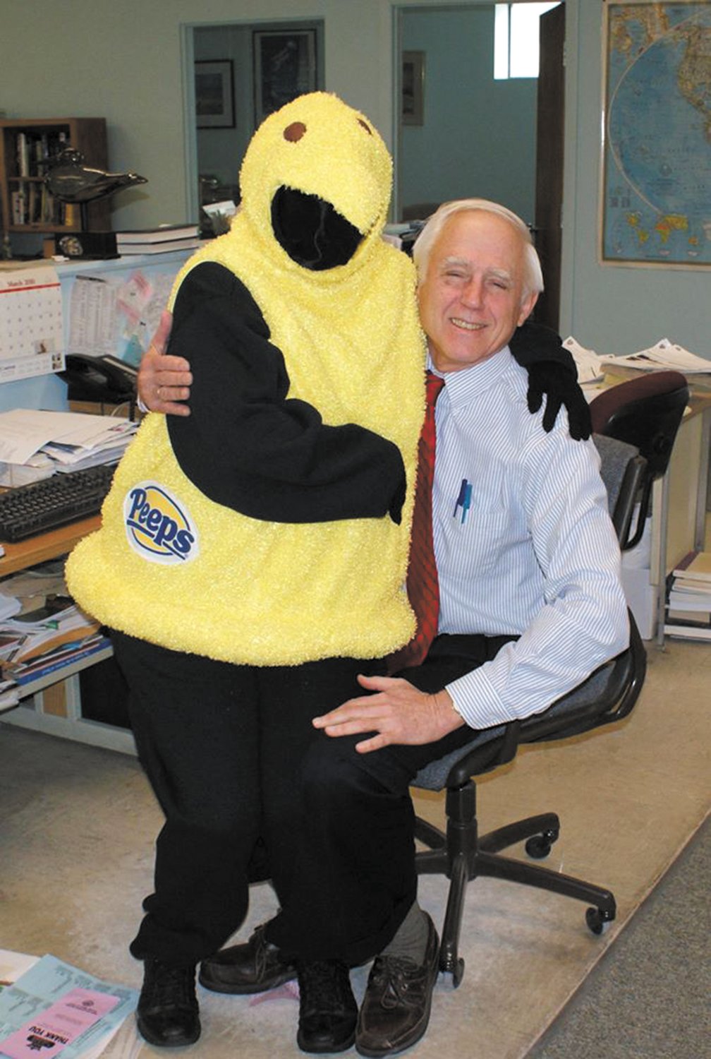 AND THEN SHE DRESSED AS A PEEP: After launching her “Peeps Show” with giant-sized hand held Peeps, Meri notched it up with a Peeps outfit which she wore into the Beacon Communications (Beacon, Herald and Sun Rise) office. Here she shows it off to publisher John Howell.